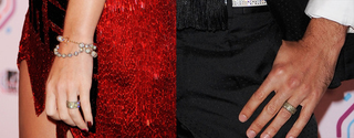 Illustration for article titled You Can't Miss Russell Brand & Katy Perry's Giant Wedding Rings